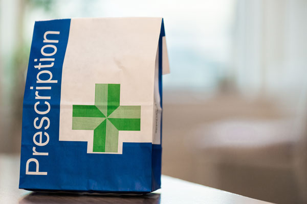 Paper bag that says Prescription